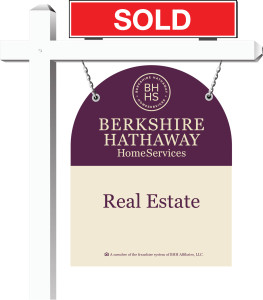 Berkshire Hathaway HomeServices Yard sign with red sold sign rider